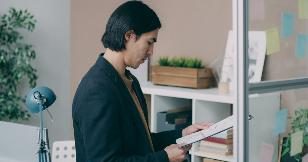 person organizing sustainable files
